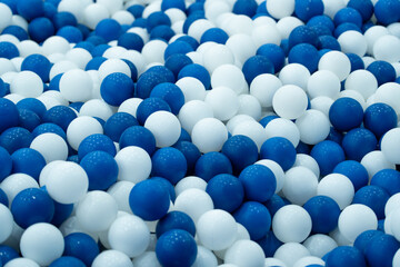 blue and white plastic balls or Ocean ball background.