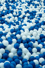 blue and white plastic balls or Ocean ball background.