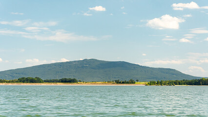 Zalew Mietkowski, mountain landscape with a view of Mount Sobotka. A popular place for summer recreation and water sports.