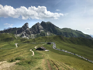 Fototapeta premium mountain landscape with winding road in the mountains, shelter