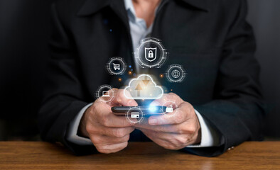 Businessman use smartphone with cloud computing diagram show on hand. Cloud technology. Data storage,cybersecurity,online shopping .Networking and internet service concept.