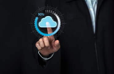 Progress bar loading concept. Businessman touch a cloud computing icon on virtual screen waiting for interface.Technology and business.