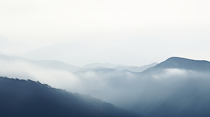 Fototapeta premium Foggy Mountain Valley with Soft Light and Shadows