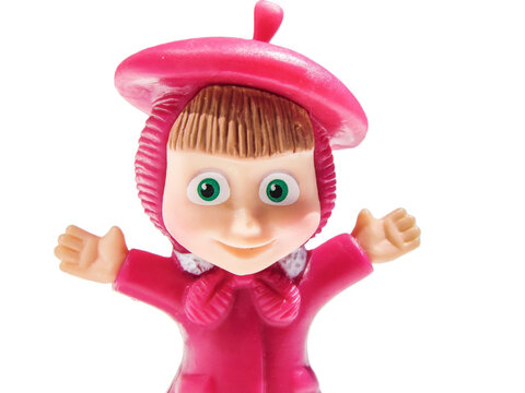 Baia Mare, Romania - August 4 2022: Masha toy from the cartoon Masha and the Bear. Isolated on white
