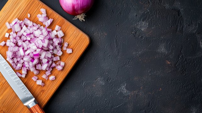 chopped red onion on wooden cutting board with knife and whole onion on black background, flat lay food photography for recipe blog and culinary website