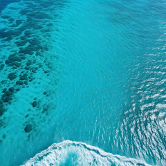 Aerial view beautiful of sea waves from drone. Stock image of blue color of ocean water, sea surface, sunset. Top view on turquoise waves, clear water surface texture.