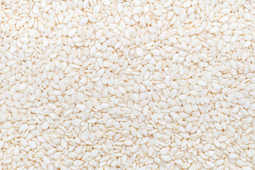 Close up real white sesame seed background.