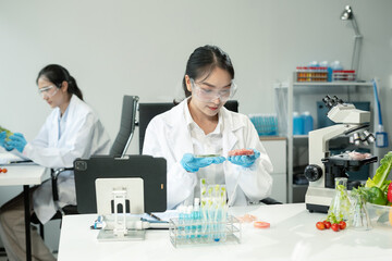 Team Microbiologists Analyzing Molecular Samples in Advanced Food Science Laboratory, Dietitian food and medicine.