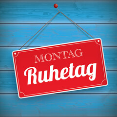 Obraz premium Rotes Schild Montag Ruhetag, blaue Holzwand