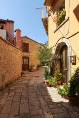 A street between old houses of Isernia, a city in Molise,  Italy.