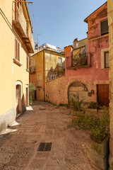 A street between old houses of Isernia, a city in Molise,  Italy.