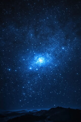 Obraz premium Night Sky Nebula, A breathtaking view of a starry night sky featuring a stunning blue nebula, perfect for showcasing the beauty of the cosmos