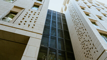 Cityscape office buildings with modern corporate architecture - business and success concept