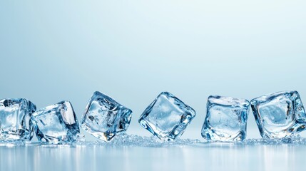 Close-up of Ice Cubes on Transparent Surface with Light Blue Background