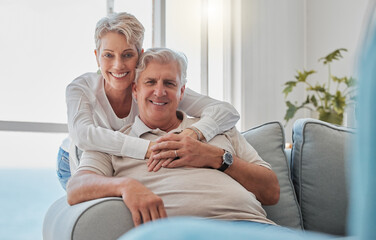 Senior, couple or portrait with hug in home for romance, bonding or marriage commitment on sofa....