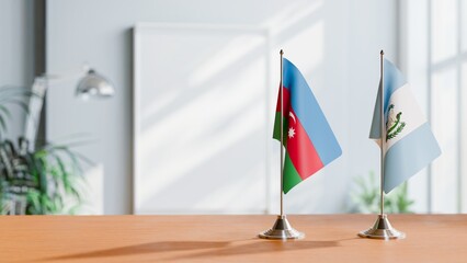 FLAGS OF AZERBAIJAN AND GUATEMALA ON TABLE