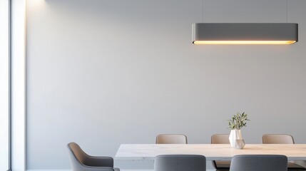 A stylish dining room with a long table, modern chairs, and a statement light fixture