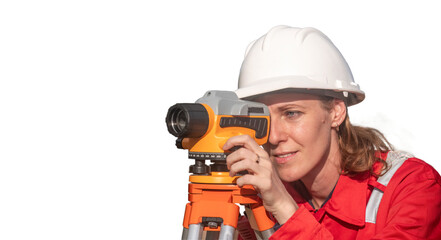 Surveyor engineers team wearing safety uniform and blueprint checking inspection by theodolite telescope to measurement level position railway construction site is industry transportation concept.