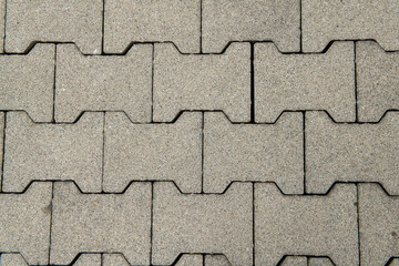 texture interlocking bricks for flooring, in interconnected concrete offer a functional and weather-resistant design. The mortar-free installation facilitates maintenance and drainage.