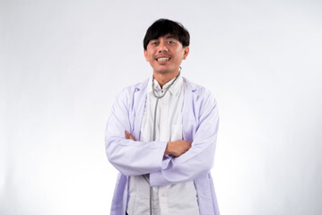 An Asian male doctor wearing a white coat and stethoscope around his neck stands confidently with...
