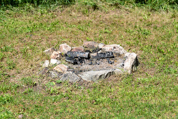 round fire place in the grass