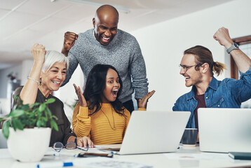 Winning, celebration and team of business people on laptop for goal, bonus or good news at startup. Excited group, creative and cheers for victory, success or award achievement with company milestone