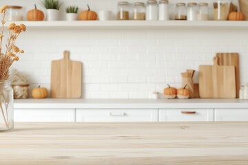 Fototapeta premium Empty tabletop over defocused kitchen with copy space.