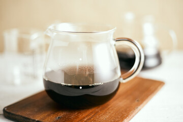black drip coffee in glass server