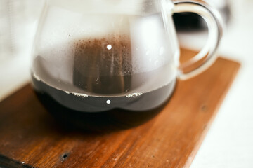 black drip coffee in glass server