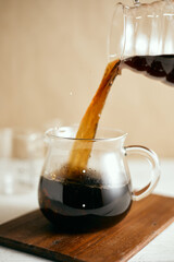 black drip coffee in glass server