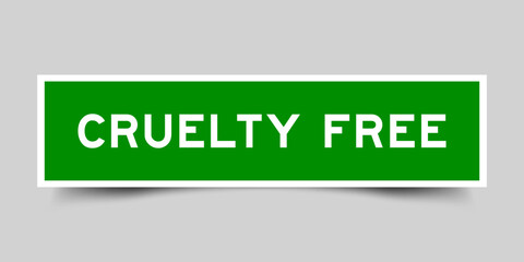 Green color square shape sticker label with word cruelty free on gray background