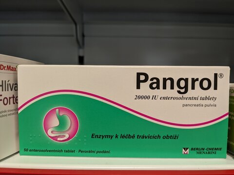 Prague, Czech Republic - August 28 2024: PANGROL box with PANCREATIN active substance by BERLIN-CHEMIE, used for digestive enzyme replacement and pancreatic support.

