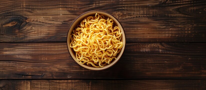 Instant Masala Maggi displayed on dark wood with copy space image