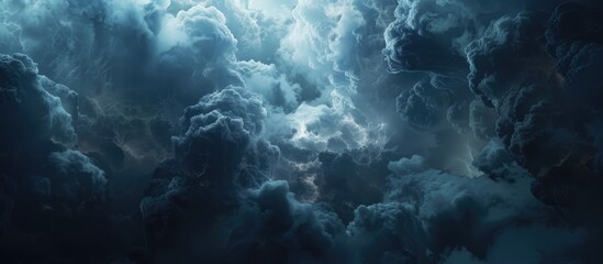 An isolated wallpaper featuring a stormy cloud in a dark blue sky with copy space image