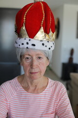 Senior woman feeling like a monarch 