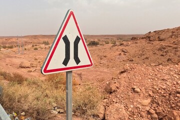Narrow Road Ahead Warning Sign
