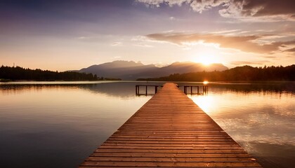 lake at sunset long wooden pier