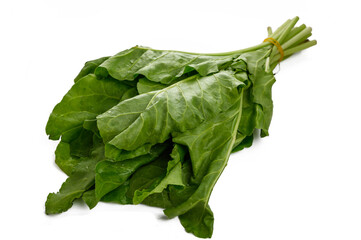 Green spinach leafs on a white background