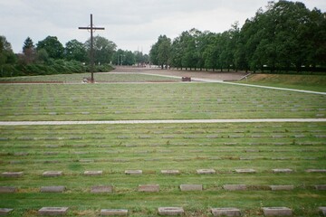 national cemetery in Terezin in Czechia on 8. May 2024 on color film - blurriness and noise of scanned 35mm film were intentionally left in image