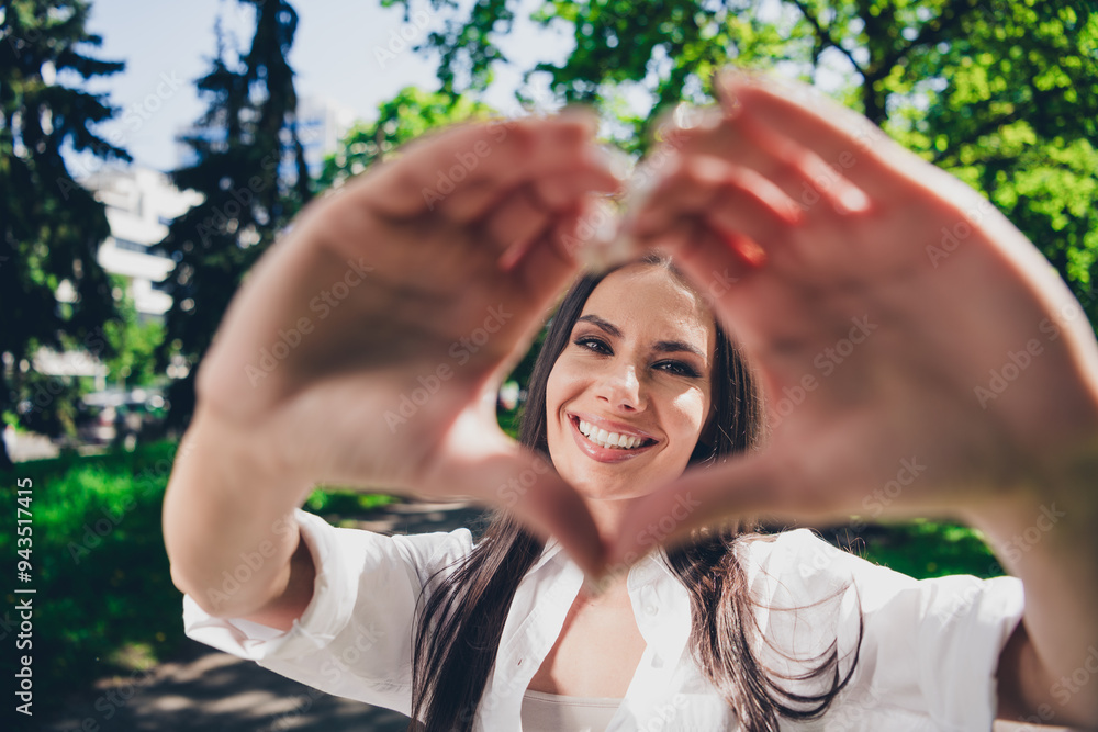 Canvas Prints Photo of attractive young cheerful girl show heart symbol wear white garment having fun outside outdoors