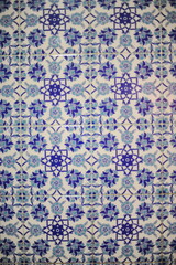 Traditional Turkish ceramic tiles, closeup photo of decorative, vintage, blue, cyan, historic tiles on the wall in Turkey (Türkiye)