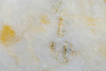 Colorful yellow old stone background with dark cracks, great for your design and texture background. Horizontal image.