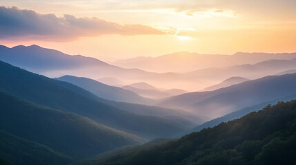 Fototapeta premium Scenic view of a mountain landscape during sunrise