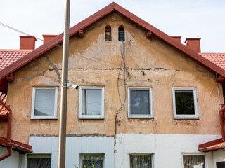 shabby facade of urban house in Zelenogradsk town