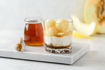 dessert with melon in a glass