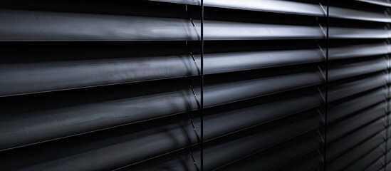 Polyester and PVC blend in black roller blind texture create an ideal background with copy space image