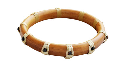 A beautifully crafted bamboo ring adorned with decorative fasteners, perfect for traditional music or cultural performances. Isolated on transparent background.