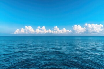 Calm seas with light breezes and scattered clouds, perfect for boating, weather conditions, calm and clear