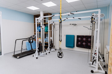 Fitness gym with professional equipment for workouts and physical therapy - perfect for training