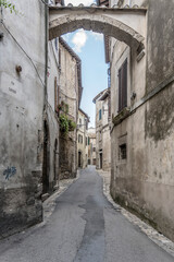 Fototapeta premium narrow winding Cavour street at medieval hilltop little town, Amelia, Italy